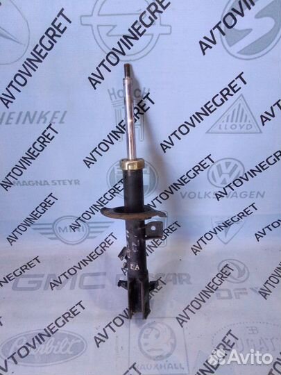 Стойка амортизатор передняя левая Nissan Cube