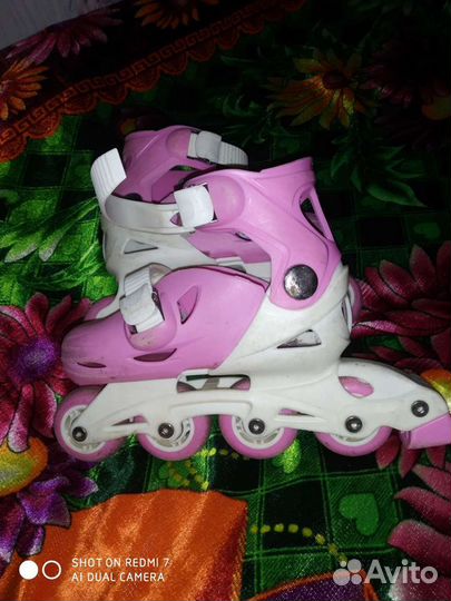 Роликовые коньки