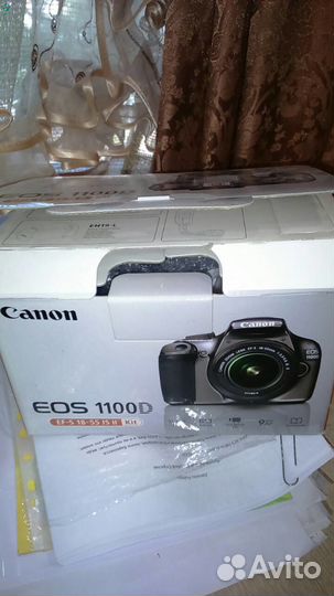 Продам зеркальный фотоаппарат Canon 1100D