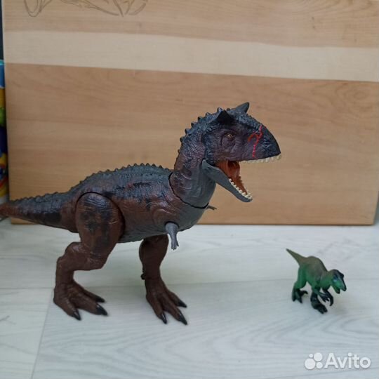 Игрушка динозавр