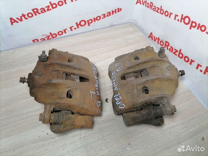 Суппорт передний Opel Omega B
