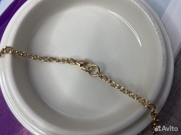 Ожмрелье с павлином с синими стразами