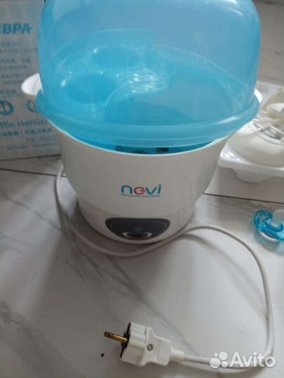 Молокоотсос электрический и Стерилизатор