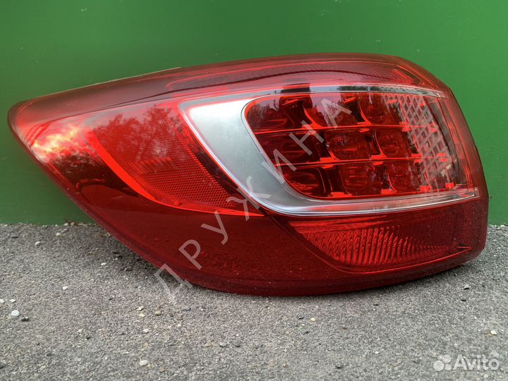 Фонарь левый Kia Sportage 3