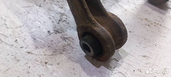 Рычаг задний верхний левый 20252FG010