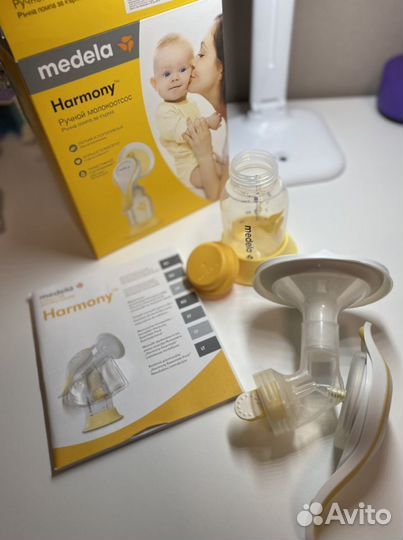 Молокоотсос medela новый
