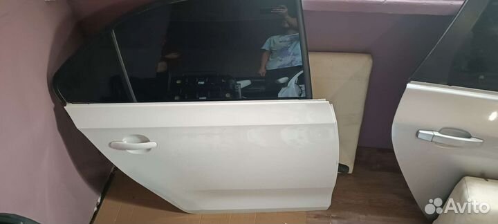 Двери на skoda rapid