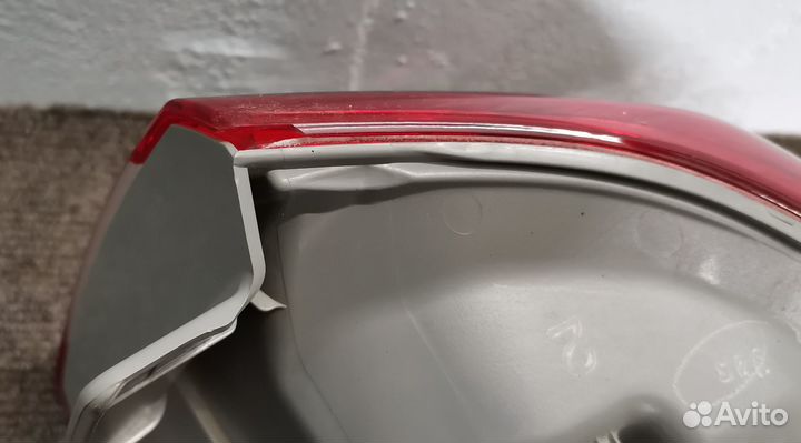 Фонарь левый внешний Toyota Corolla E150