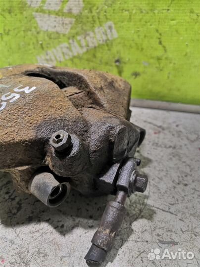 Суппорт передний левый Фольксваген Пассат Б6