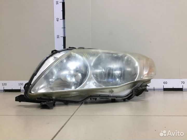 Фара левая Toyota Corolla E150 2006-2013