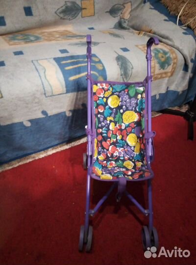 Игрушечная коляска для кукол