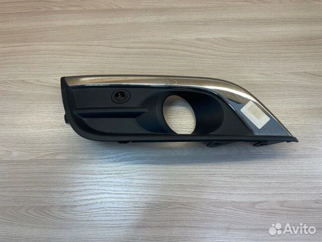 Заглушка противотуманной фары передняя левая