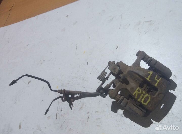 Суппорт тормозной задний левый KIA RIO QB Solaris