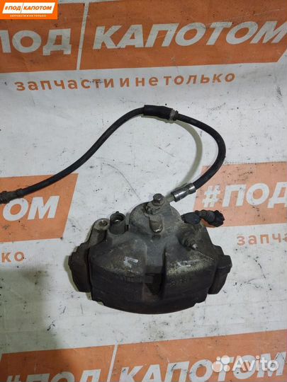 Суппорт тормозной передний левый Skoda Octavia