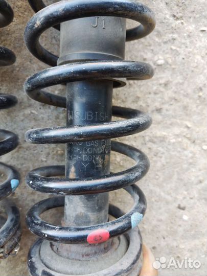 Стойки задние lancer 9