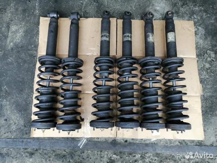 Задние стойки в сборе бмв Е38 задние амортизаторы