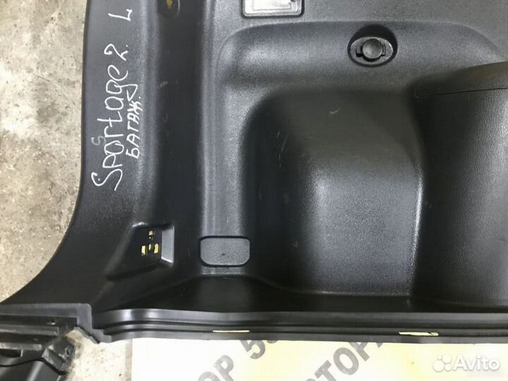 Обшивка багажника L Kia Sportage 2