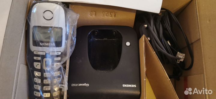 Переносной телефон