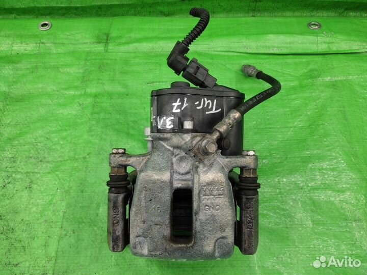 Суппорт тормозной з/л + моторчик Tiguan/Passat