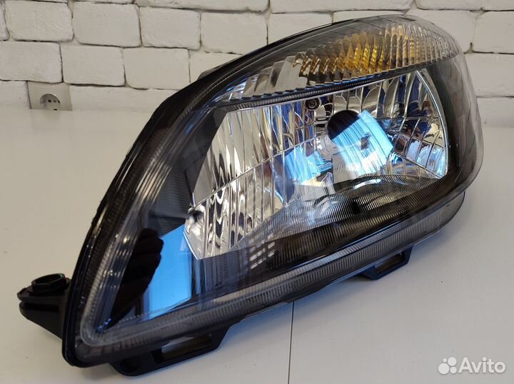 Фара левая Skoda Fabia (5J) 2007-2014