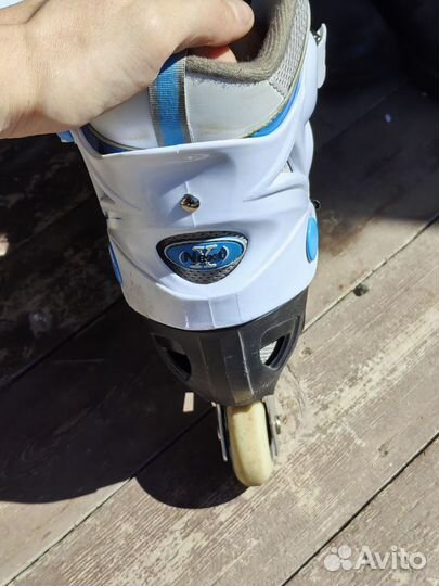 Роликовые коньки