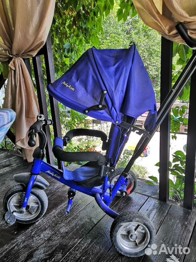 Трехколесный велосипед с родительской ручкой