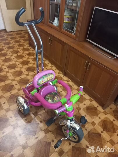 Трехколесный велосипед с ручкой