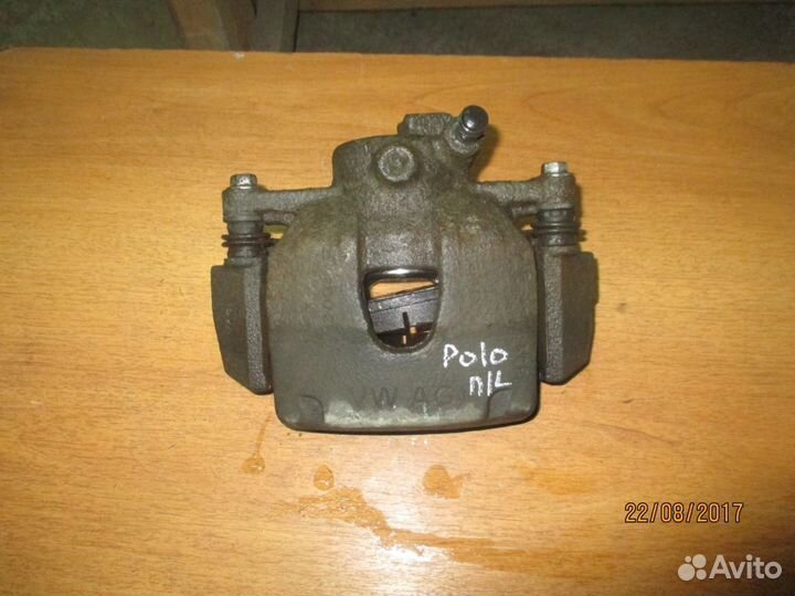Суппорт передний левый VW Polo Фольксваген Поло