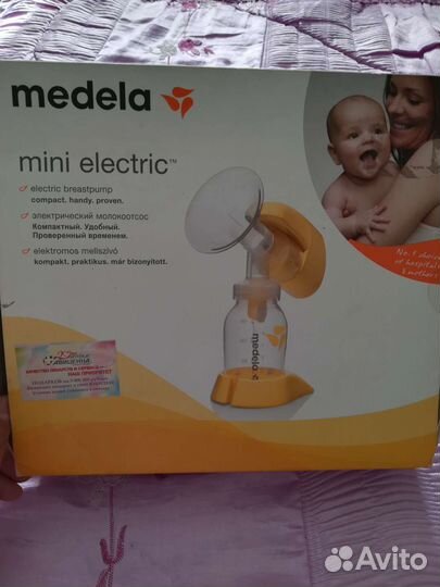 Молокоотсос medela электрический