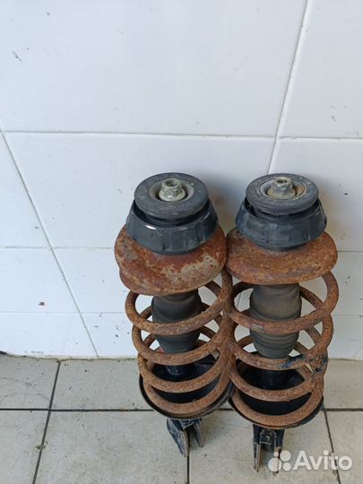 Передние стойки Рено Логан