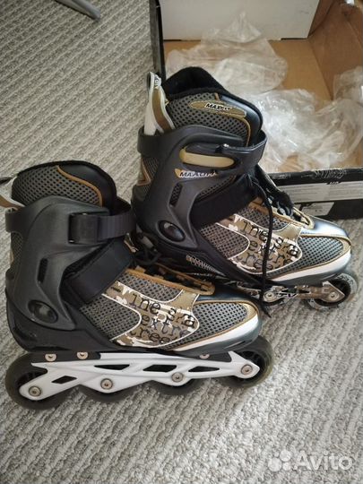 Роликовые коньки