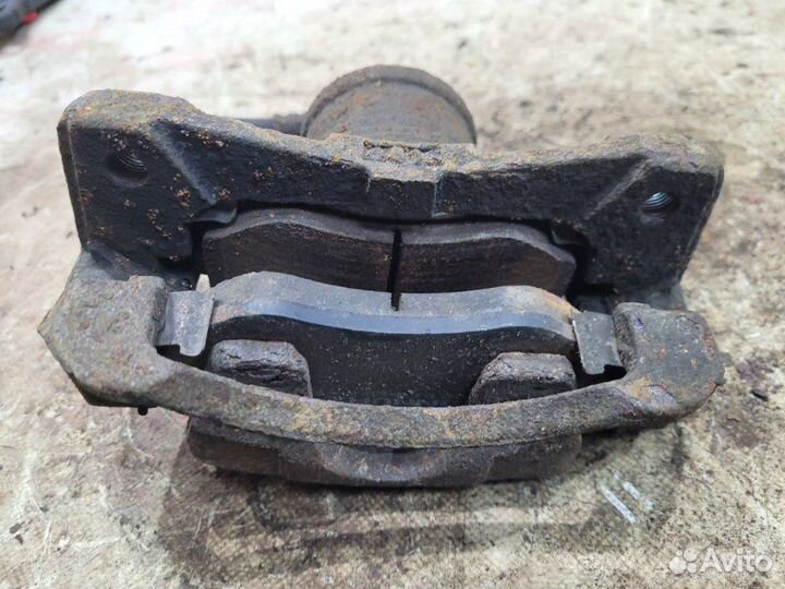 Суппорт передний левый Chevrolet Aveo T250 F14D4