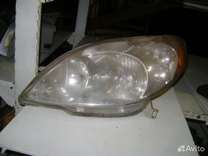 Фара левая Toyota Corolla E12 Тойота Королла Е12