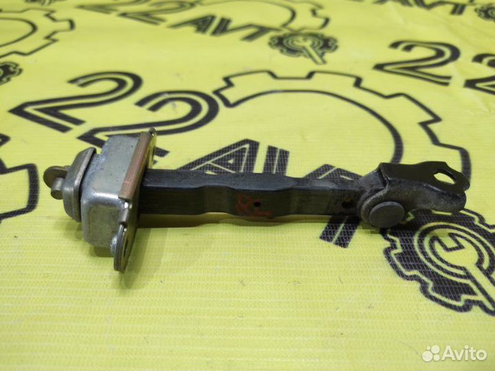 Ограничитель двери задний левый Nissan Primera