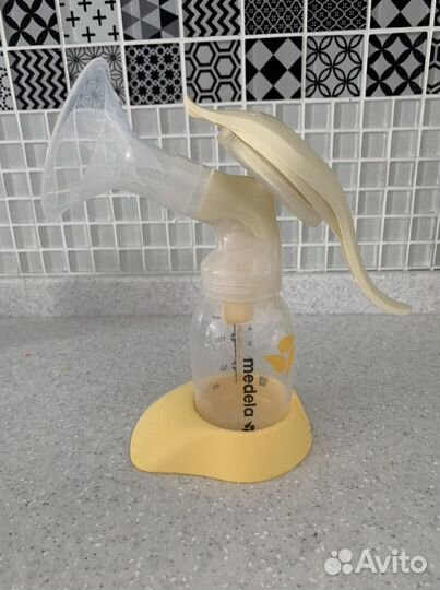 Молокоотсос ручной medela