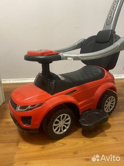 Машинка каталка с ручкой