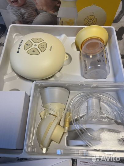 Молокоотсос medela swing flex электрический