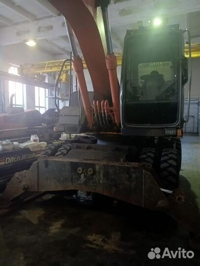 Колёсный экскаватор Hitachi ZX160W, 2006