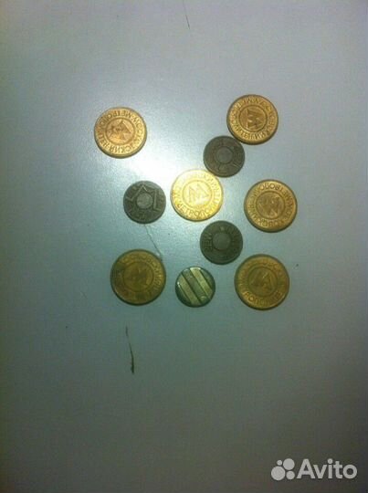 Железные монеты и жетоны