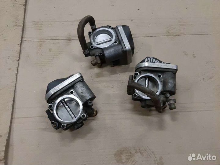 Дросельная заслонка Opel Astra H Vectra C