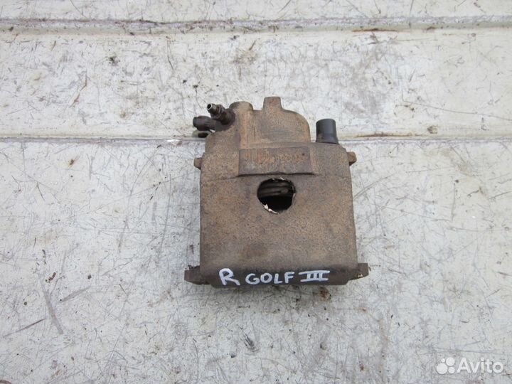 Суппорт передний правый Volkswagen Golf 3