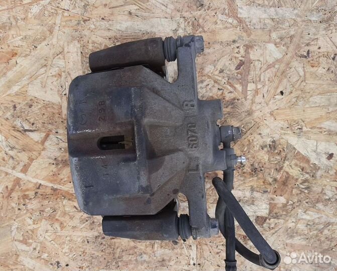 Суппорт тормозной передний правый Mazda CX-5 KE