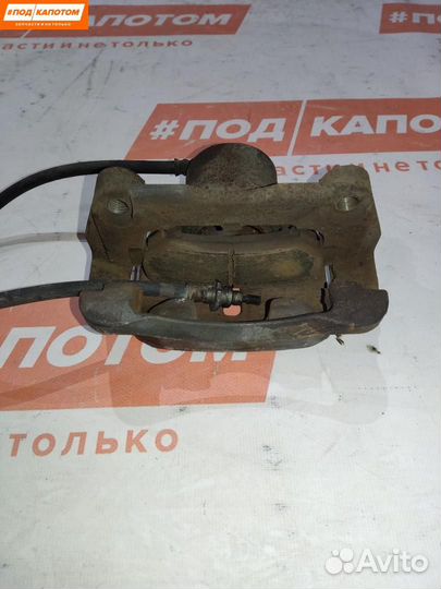 Суппорт тормозной передний левый Nissan X-Trail