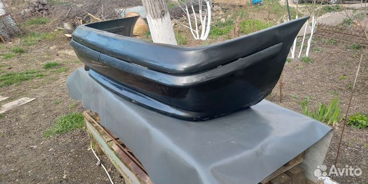 Задний бампер Opel Calibra