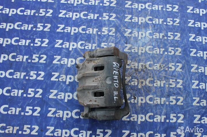 Суппорт передний левый Киа Соренто