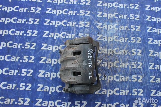 Суппорт передний левый Киа Соренто