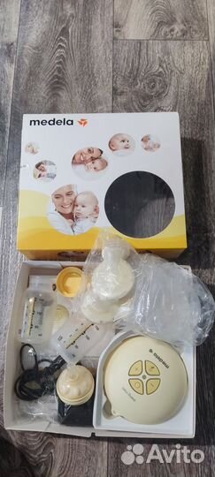 Молокоотсос medela электрический