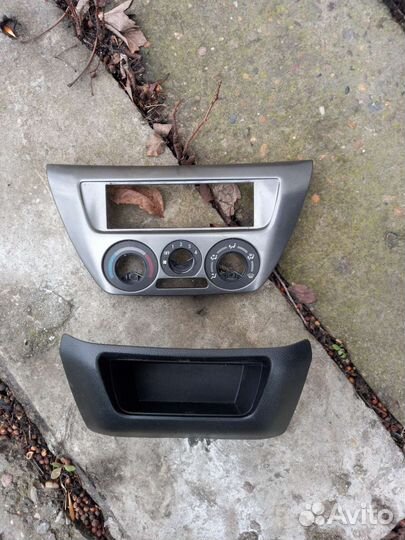 Рамка торпеды под печку и магнитолу на lancer 9