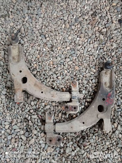 Передний рычаг Kia Spectra