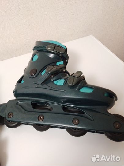 Роликовые коньки